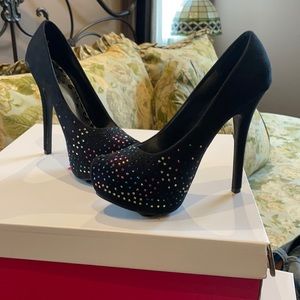 Black pumps 4.5 inch heel. Worn once